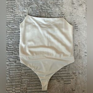 Alice + Olivia satin white tank bodysuit. Size large - minor visible wear